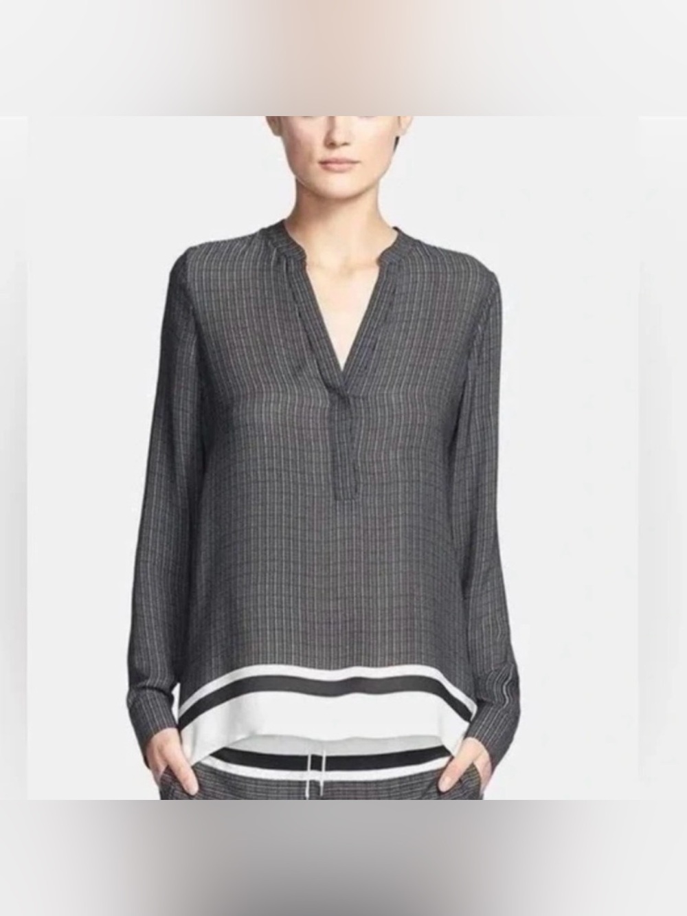 Vince blouse is crafted from 100% black and off-white silk